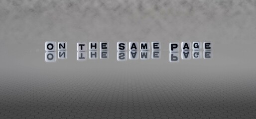on the same page word or concept represented by black and white letter cubes on a grey horizon...