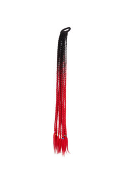 Close-up shot of an elastic hair band with afro braids of black and red ombre color. The braided ponytail is isolated on a white background. Side view.