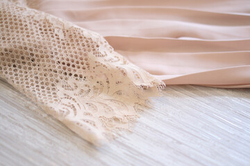 delicate lace dress. Soft pink fabric in pastel colors.