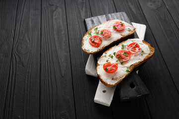 Toasts with microgreens on the table. Healthy food, vegan food and dieting concept.
