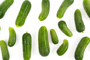 Whole cucumbers isolated on white background. Food backgrounds.