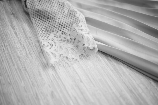 delicate lace dress. Soft black and white photo of dress details
