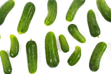Whole cucumbers isolated on white background. Food backgrounds.