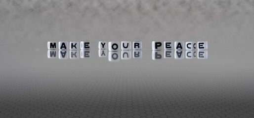 make your peace word or concept represented by black and white letter cubes on a grey horizon...