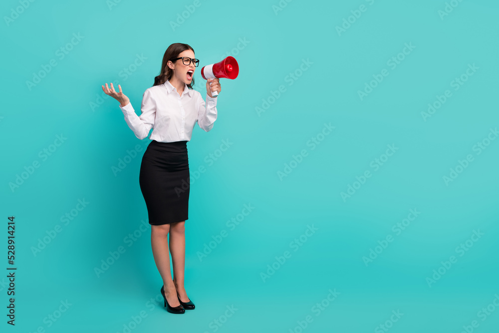 Wall mural full body photo of angry lady executive screaming loudspeaker firing workers isolated on cyan color 