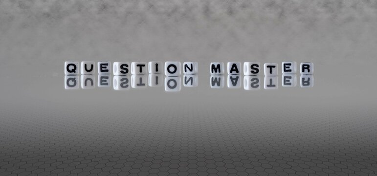 question master word or concept represented by black and white letter cubes on a grey horizon background stretching to infinity
