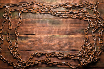 Old rusty chain top view background with copy space.