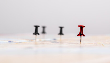 Pins on map for marking locations. Trip planning. Route marking with pushpins. Logistics or travel...