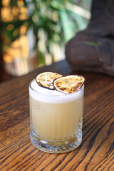 Whisky sour cocktail with foam. Classic drink with whiskey, bourbon, lemon juice, sugar and egg white.