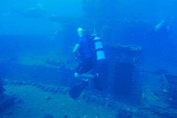 Fototapeta na wymiar The Seatiger shipwreck when SCUBA diving off of Oahu. Wreck diving adventures with Oahu Diving, your wreck dive specialist.