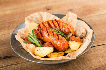 A plate of delicious potatoes and baked sausage