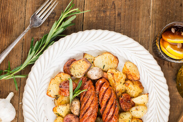 A plate of delicious potatoes and baked sausage