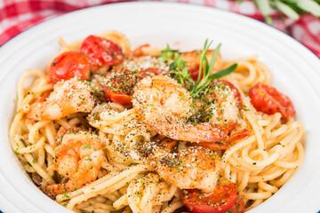A plate of Italian Seafood  shrimp noodles
