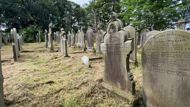 Footage of St Michael and All Angels Church Graveyard. The church is the last resting place of the Bronte family. Haworth England