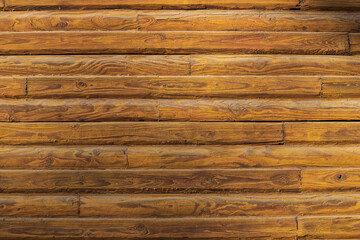 Wooden cottage wall made of individual planks