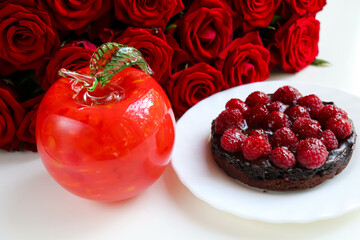 berry dessert. chocolate cheesecake with raspberries and jelly