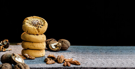 walnut cookies on a black background