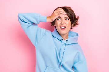 Photo of young adorable gorgeous nice woman wear blue hoodie unhappy touch head pain ache stressed...