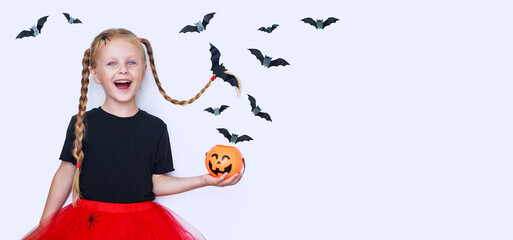 banner little cheerful girl on light background with bats halloween holiday concept
