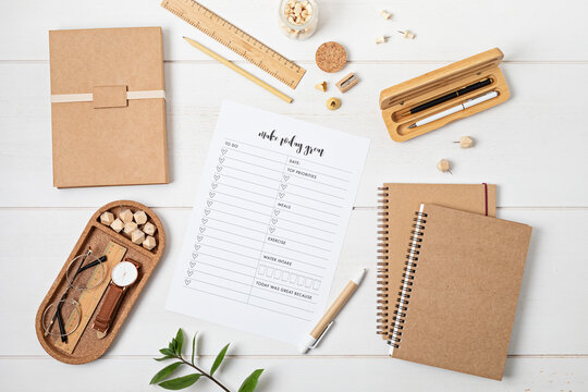 Desktop with planning template and office accessories. Organization, time managing, self-development concept. Top view, falt lay