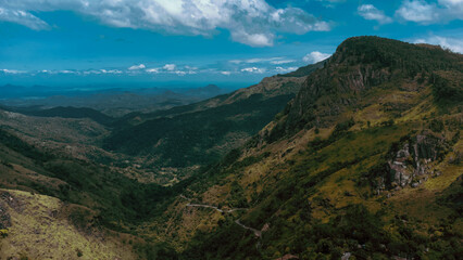 Fototapeta na wymiar Beautiful mountain landscape with green mountains and blue sky.