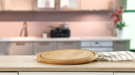 Desk of free space and kitchen interior. 