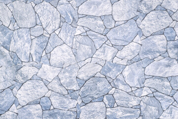 Light gray stone background with rock pattern, macro. Texture of abstract backdrop