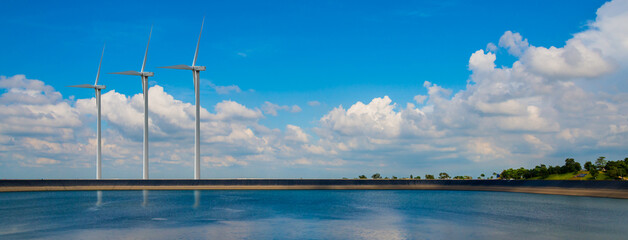Wind turbine renewable energy source summer with sky.clean energy, protect the environment.