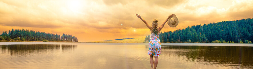 panorama landscape with woman and beautiful lake