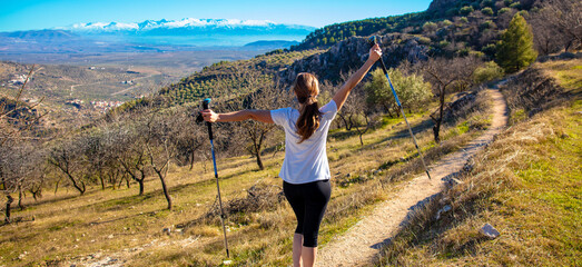 woman hiking in nature,  sierra nevada mountain- Spain - obrazy, fototapety, plakaty