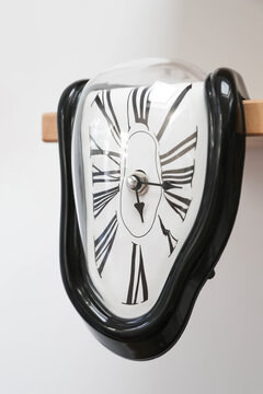 Decorative clocks drain off the shelf. The clock is a symbol of the impermanence of time. Free space for text.