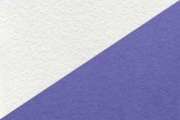 Papier Peint photo Pantone 2022 very peri Texture of craft white and very peri paper background, half two colors, macro. Structure of vintage violet cardboard.