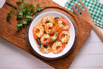 Gambas al ajillo. Shrimp Scampi. Traditional tapa recipe from the south of Spain cooked with seafood and sautéed garlic.