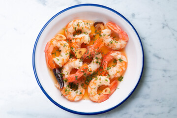 Gambas al ajillo. Shrimp Scampi. Traditional tapa recipe from the south of Spain cooked with seafood and sautéed garlic.