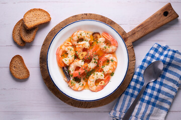 Gambas al ajillo. Shrimp Scampi. Traditional tapa recipe from the south of Spain cooked with seafood and sautéed garlic.