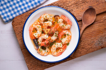 Gambas al ajillo. Shrimp Scampi. Traditional tapa recipe from the south of Spain cooked with seafood and sautéed garlic.