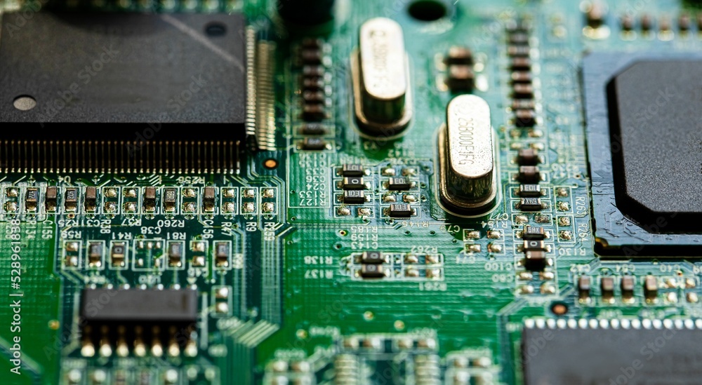 Poster macro close up of components and microchips on pc circuit board