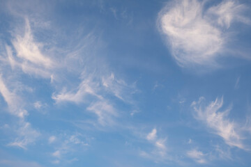 White clouds against a blue sky.