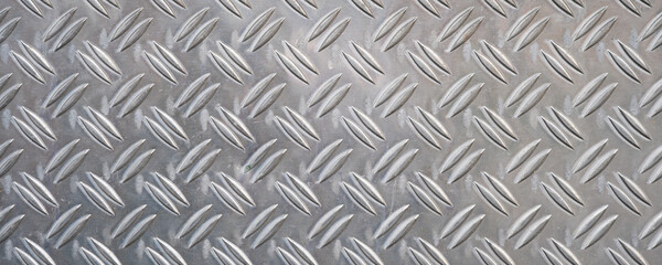 Aluminum checker plate cover metal texture pattern background panorama - obrazy, fototapety, plakaty