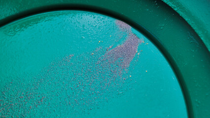 Gold flakes in a gold pan