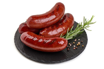 Grilled pork sausages with rosemary, close-up, isolated on white background.