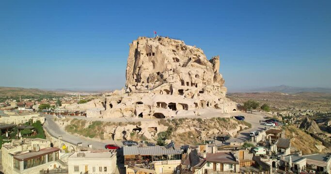 View of the city and the castle of Uchisar, Turkey. Drone view. The fortress city of Uchisar in Cappadocia. Aerial view. 