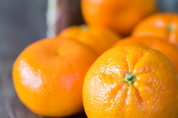 Citrus organic orange tangerine fruits in a basket