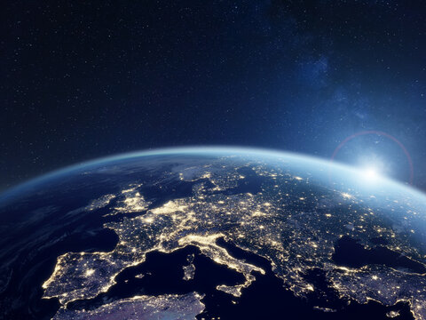 Europe at night viewed from space with city lights showing activity in European Union countries. 3d render of planet Earth. Elements from NASA. Technology, global communication, world.