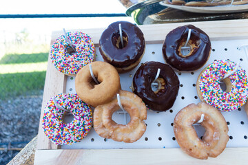 Fresh assorted Donuts on display at outdoor picnic