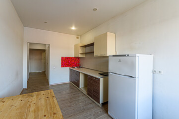 Russia, Moscow- May 21, 2020: interior apartment kitchen and dining room, refectory area cooking equipment, table furniture stove