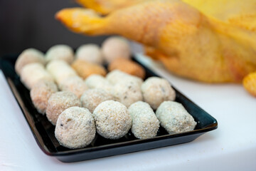 Chicken meatballs on a market