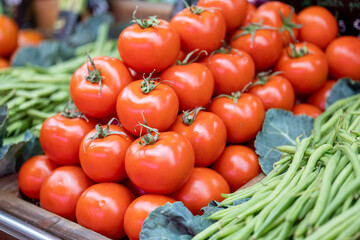 fresh tomatoes in a market