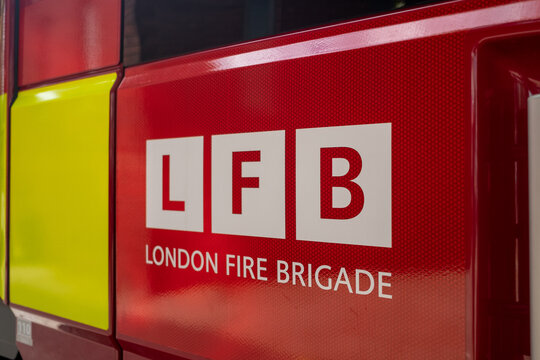 London- London Fire Brigade logo on the side of a fire engine 