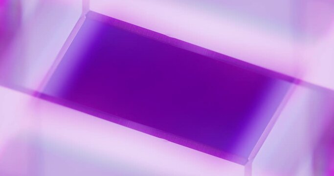 Neon light reflection. Glowing geometric background. Defocused purple pink color illumination abstract free space for text. Seamless loop rotation. Shot on RED Cinema camera.